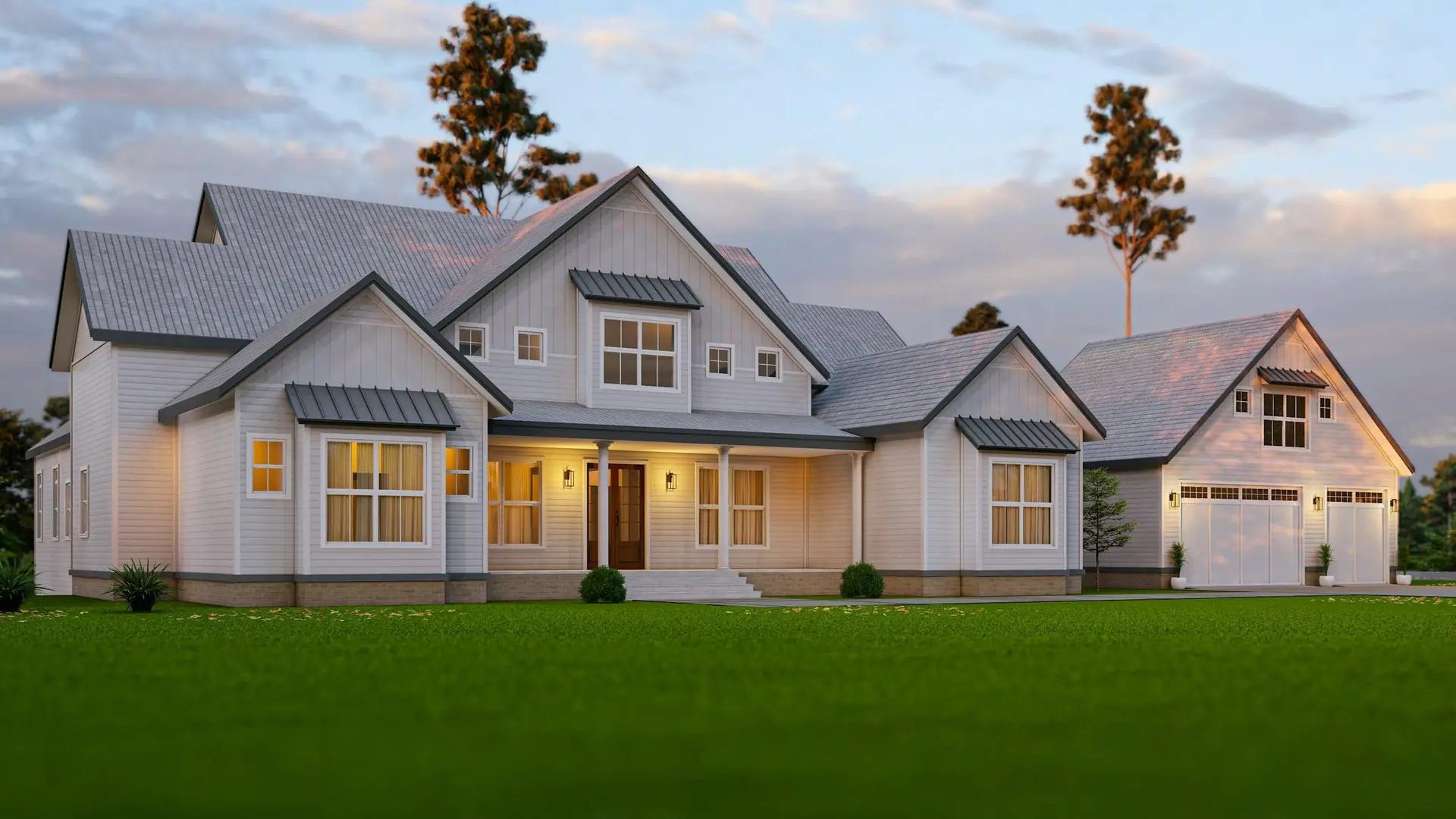 White farmhouse-style home at dusk with a steep multi-gable shingle roof