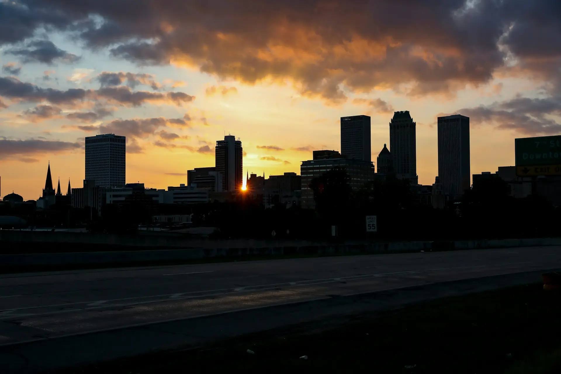 Downtown Tulsa, Oklahoma skyline silhouetted at sunset